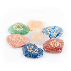 Set of 7 Heart-shaped Chakra Semiprecious stones with the Chakra symbols in Gold Engraved