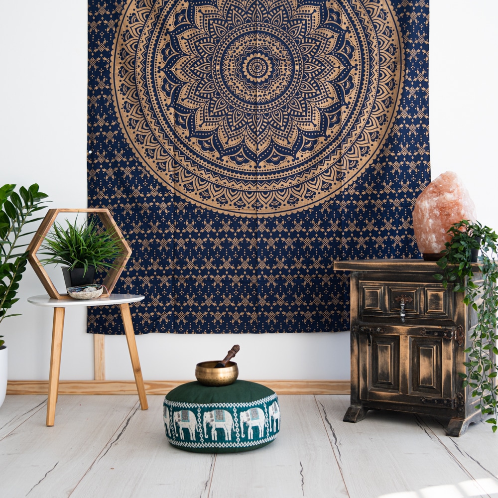 mandala tapestry, singing bowl, meditation cushion, smudge, and salt lamp