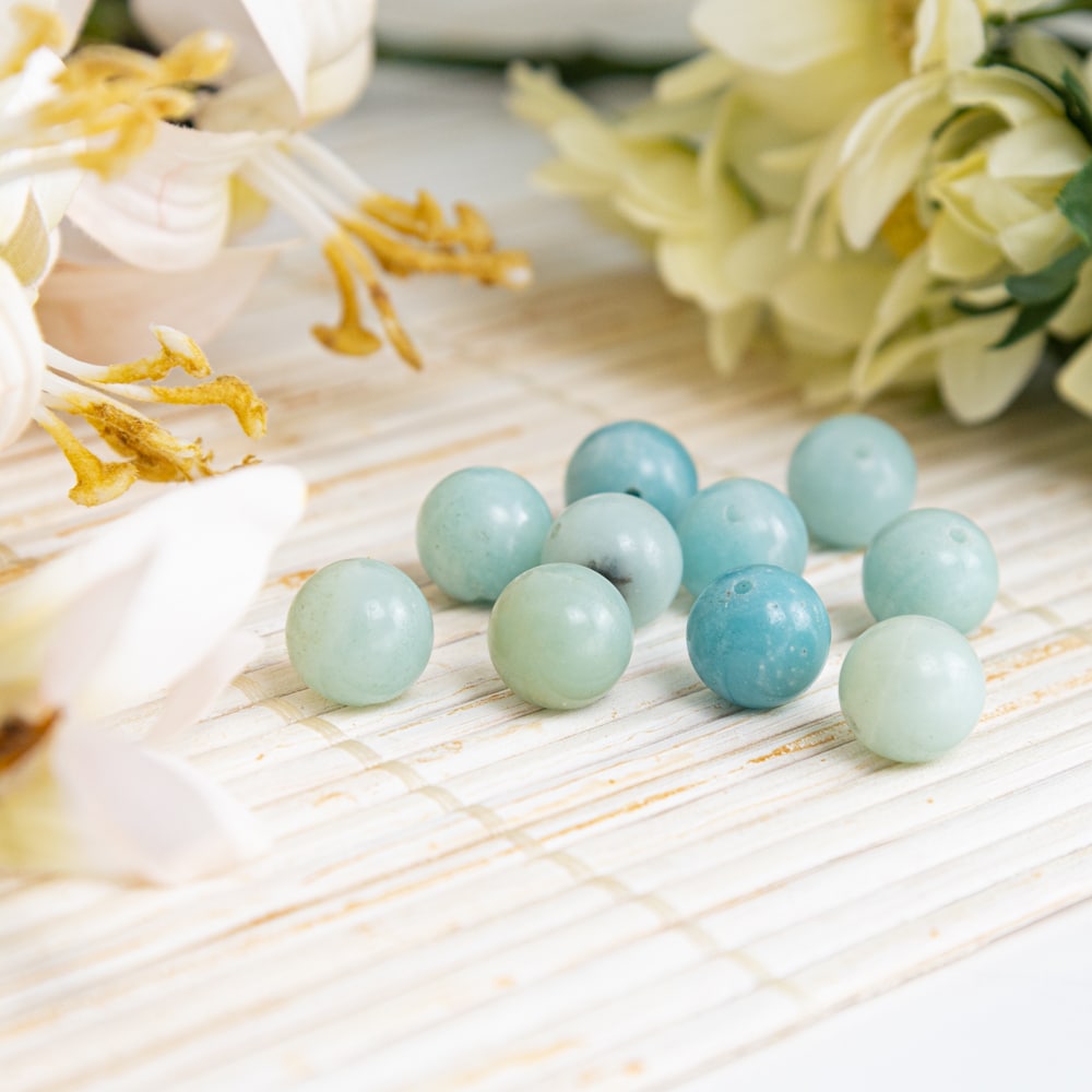 light blue amazonite beads with white flowers
