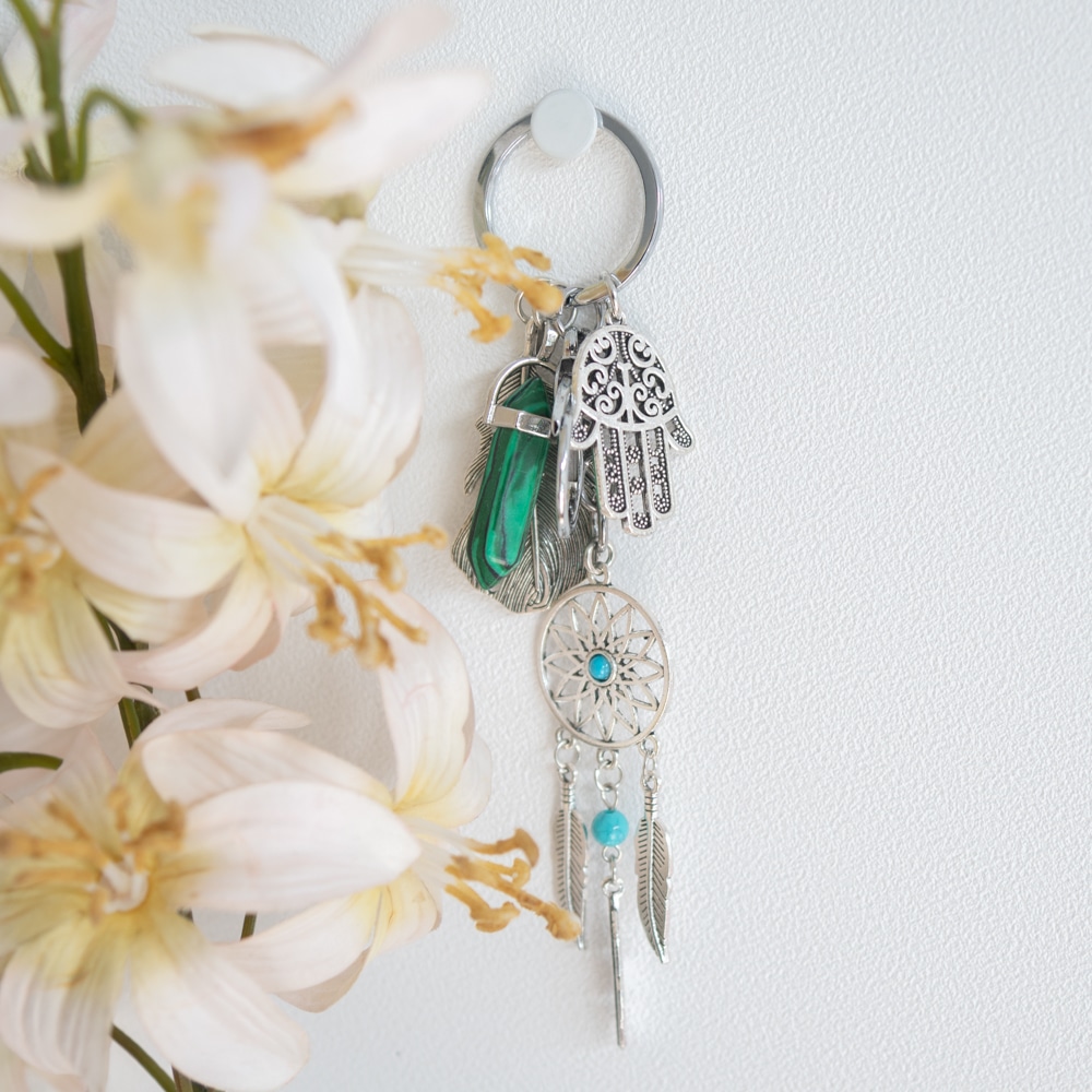 key chain with hamsa hand, gemstones, and dreamcatcher