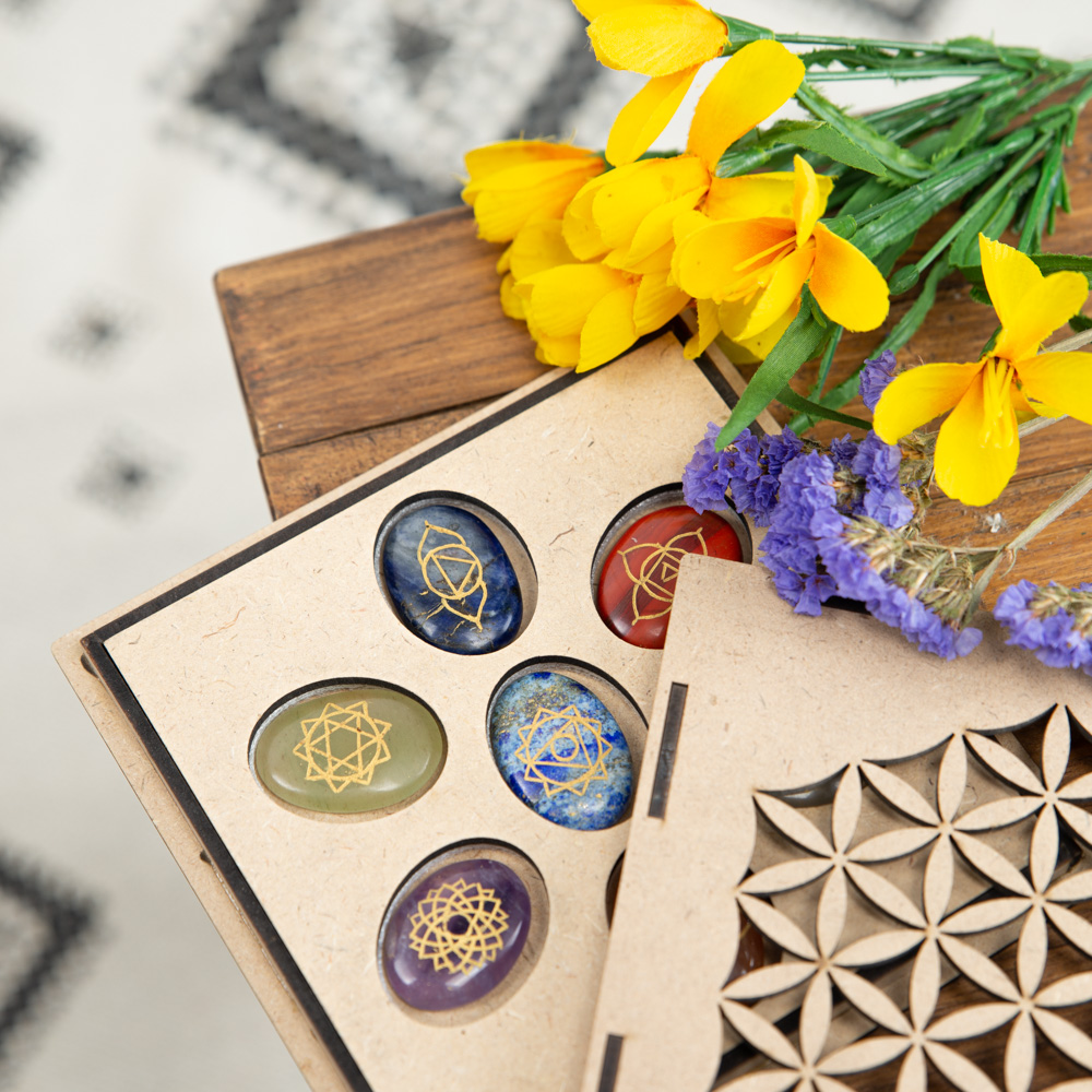 chakra stones with flower of lifebox