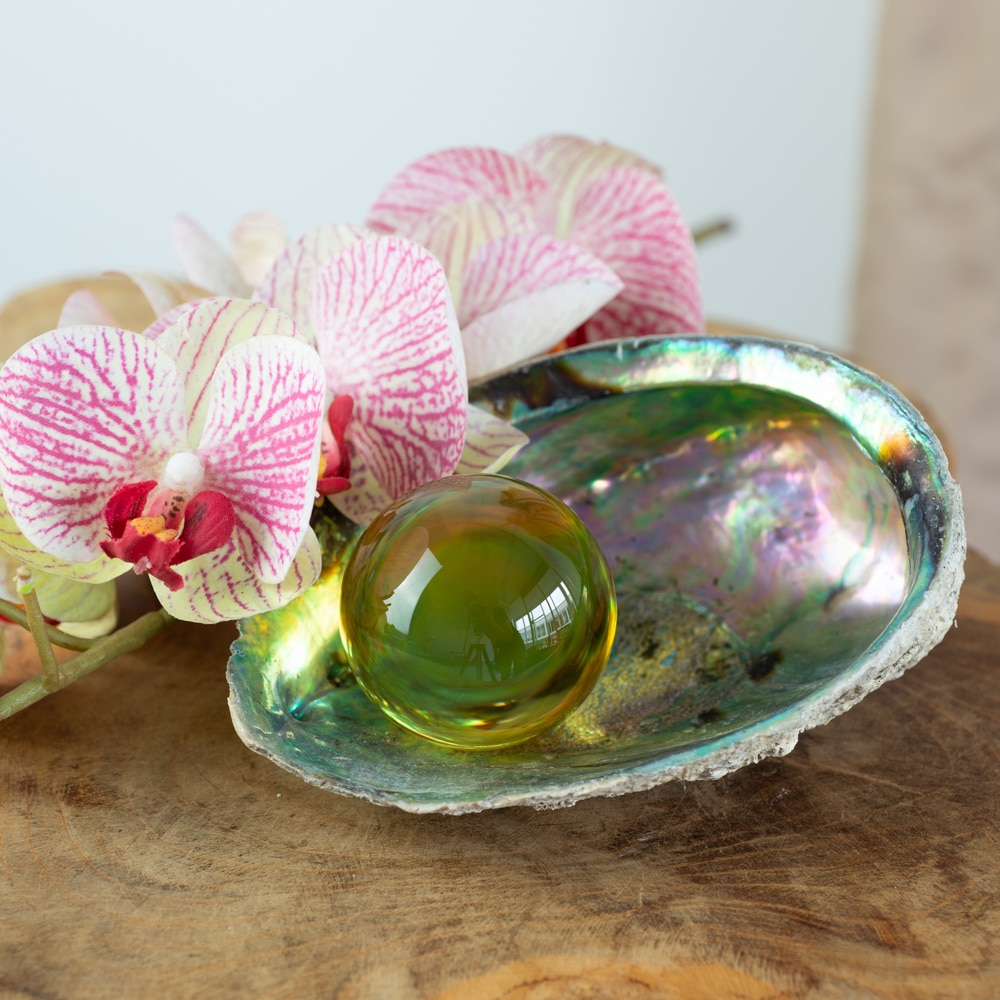 yellow feng shui solar plexus glass ball in abalone shell