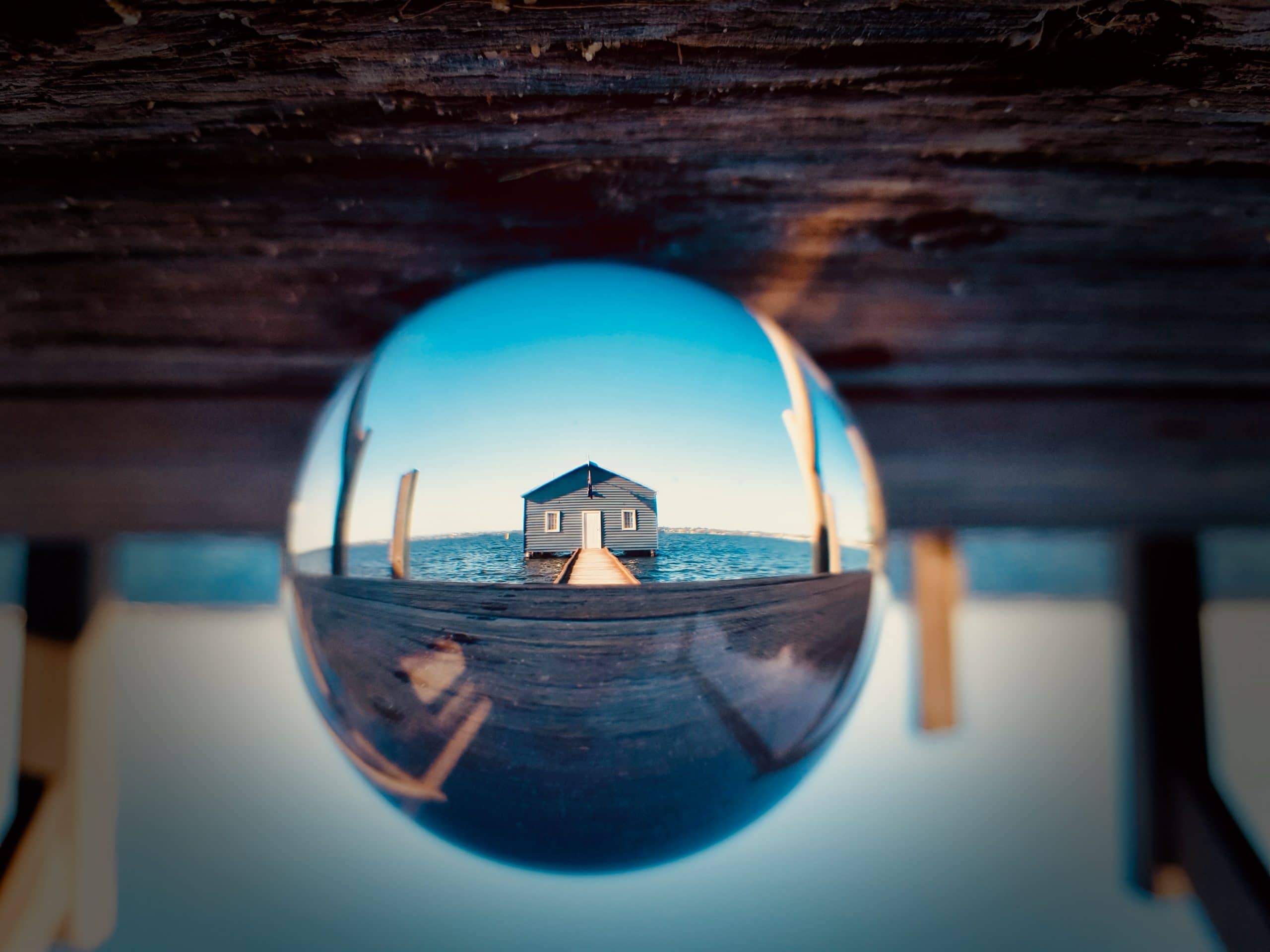 lens ball photography pier and boathouse 