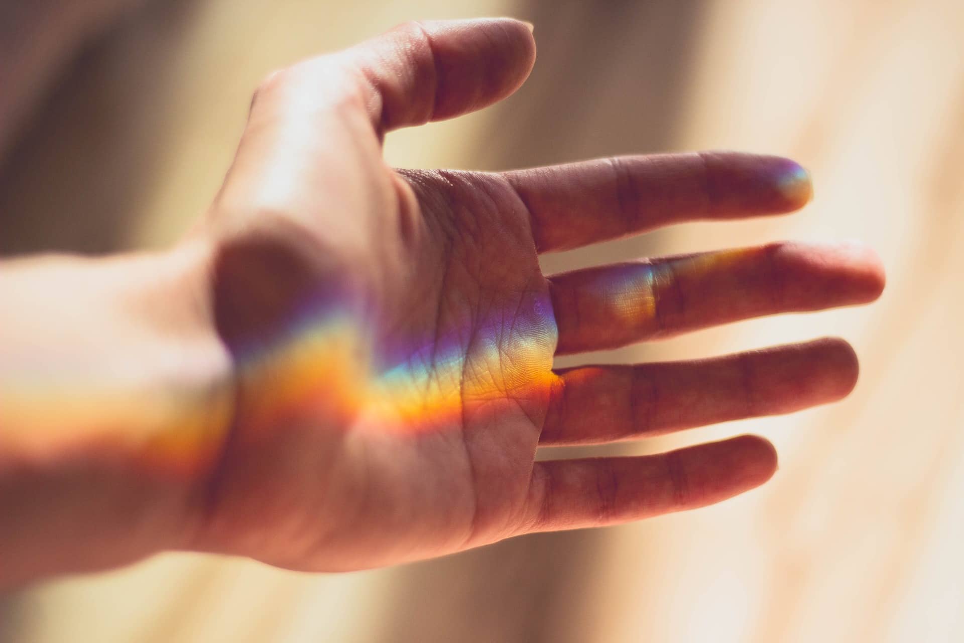 hand with prism light