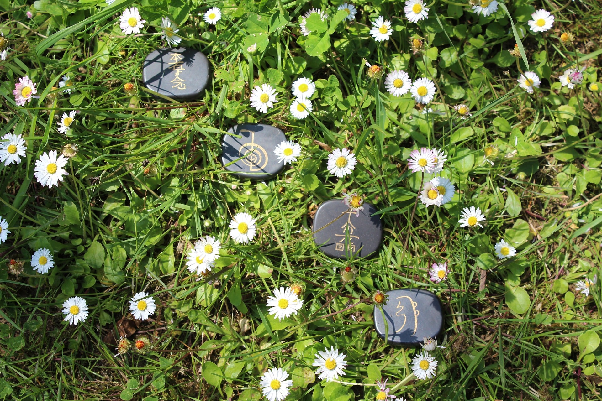 polished stones with reiki symbols