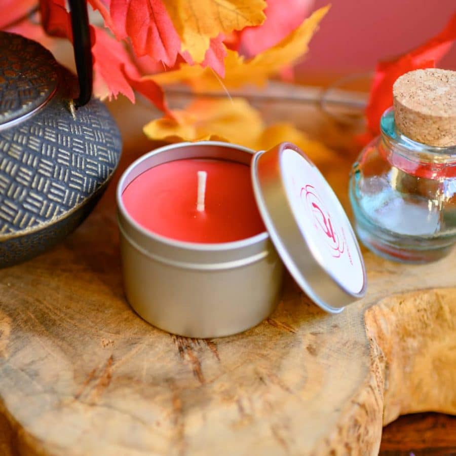 red root chakra candle in tin
