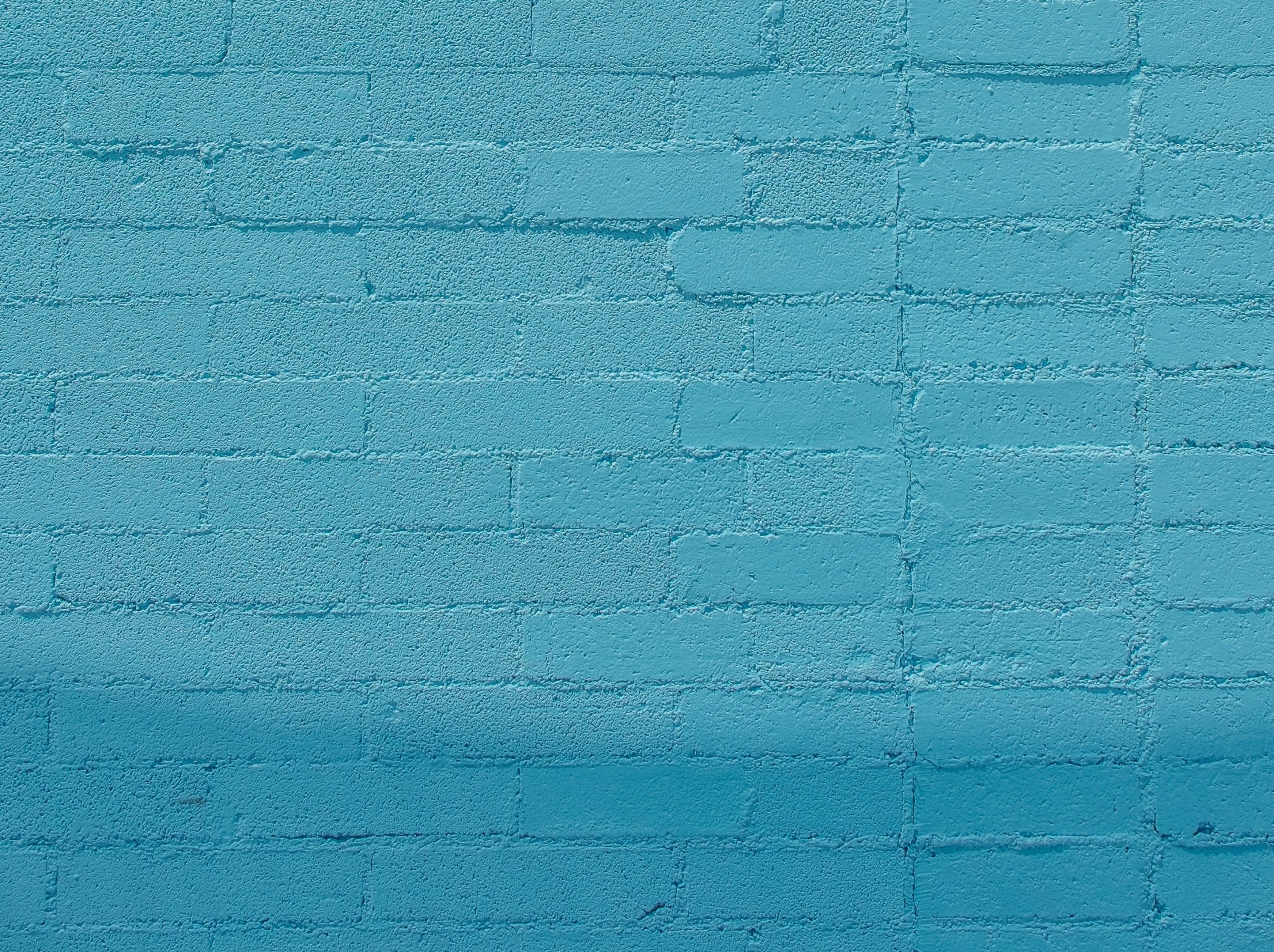 light blue brick wall
