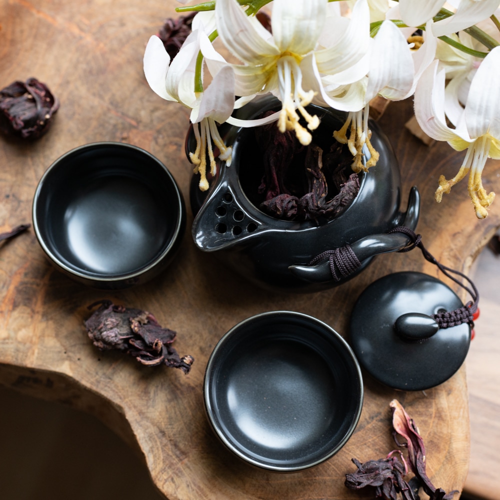 traditional Chinese tea set with dried herbs