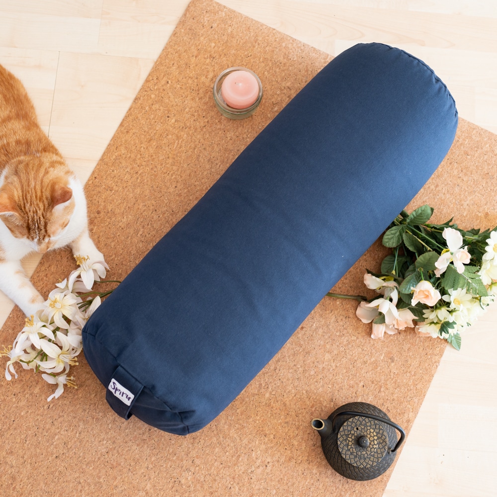 grey spiru yoga bolster on cork yoga mat with cat