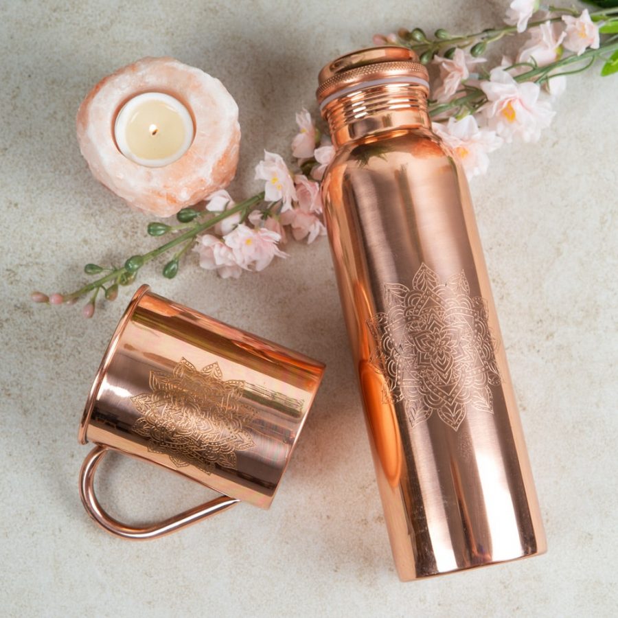 copper water bottle and copper drinking cup with salt lamp tea light holder