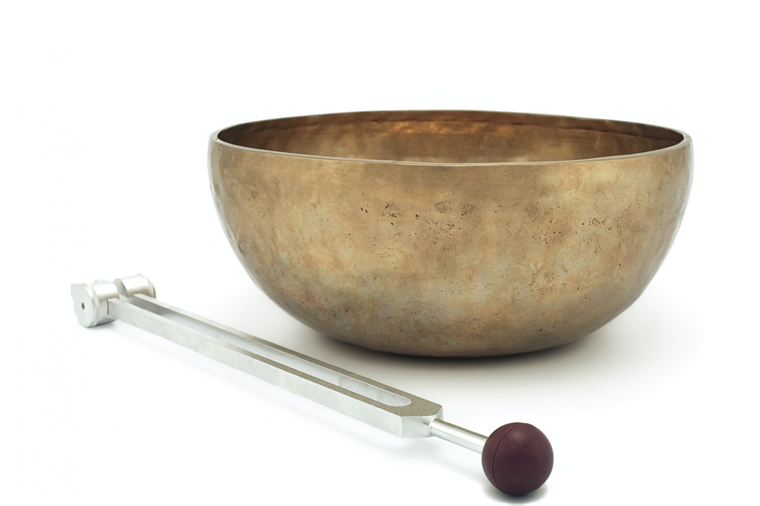 weighted tuning fork and singing bowl