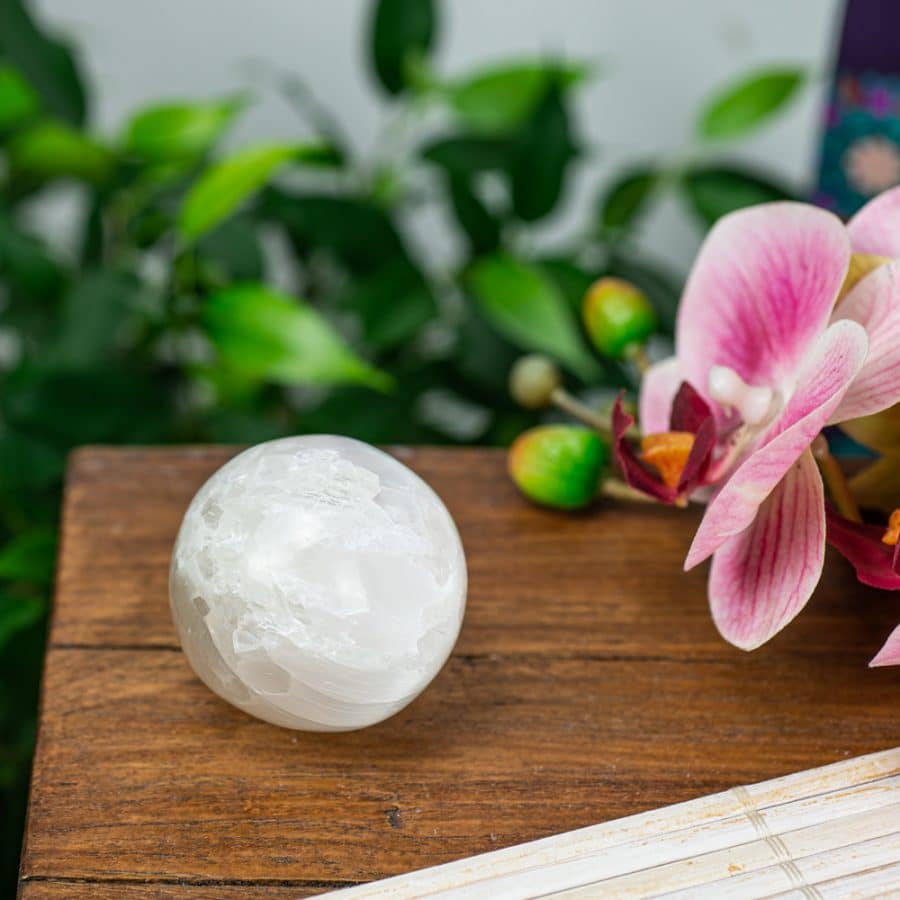 selenite crystall ball white with orchids