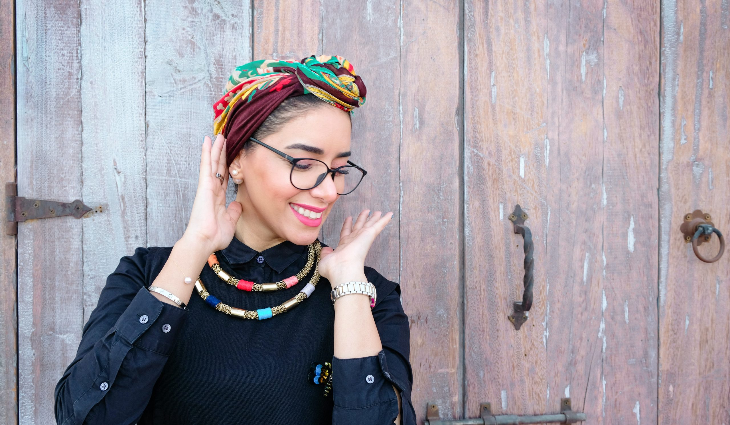 happy woman Indian jewelry head scarf