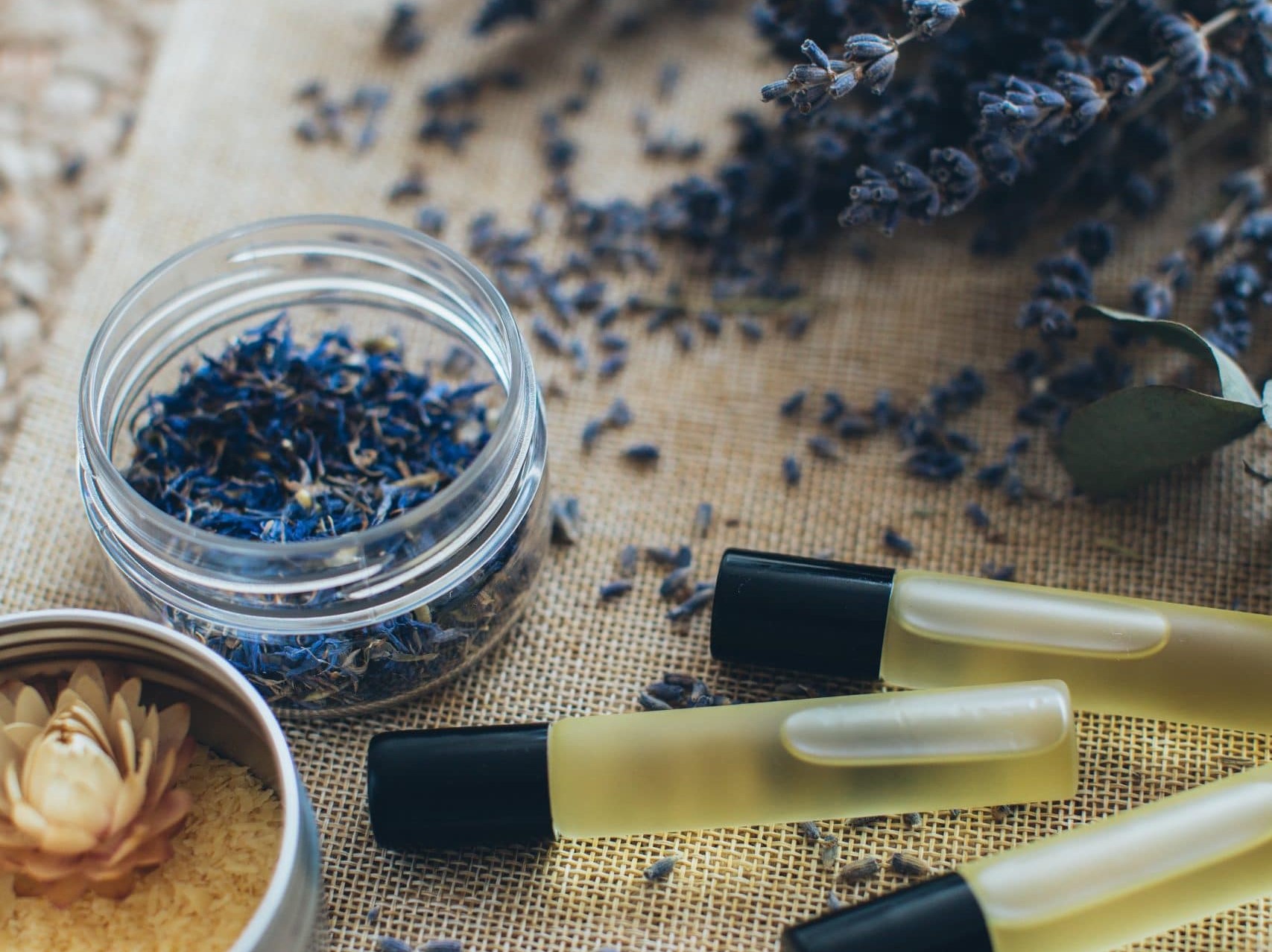 essential oils with lavender and dried flowers