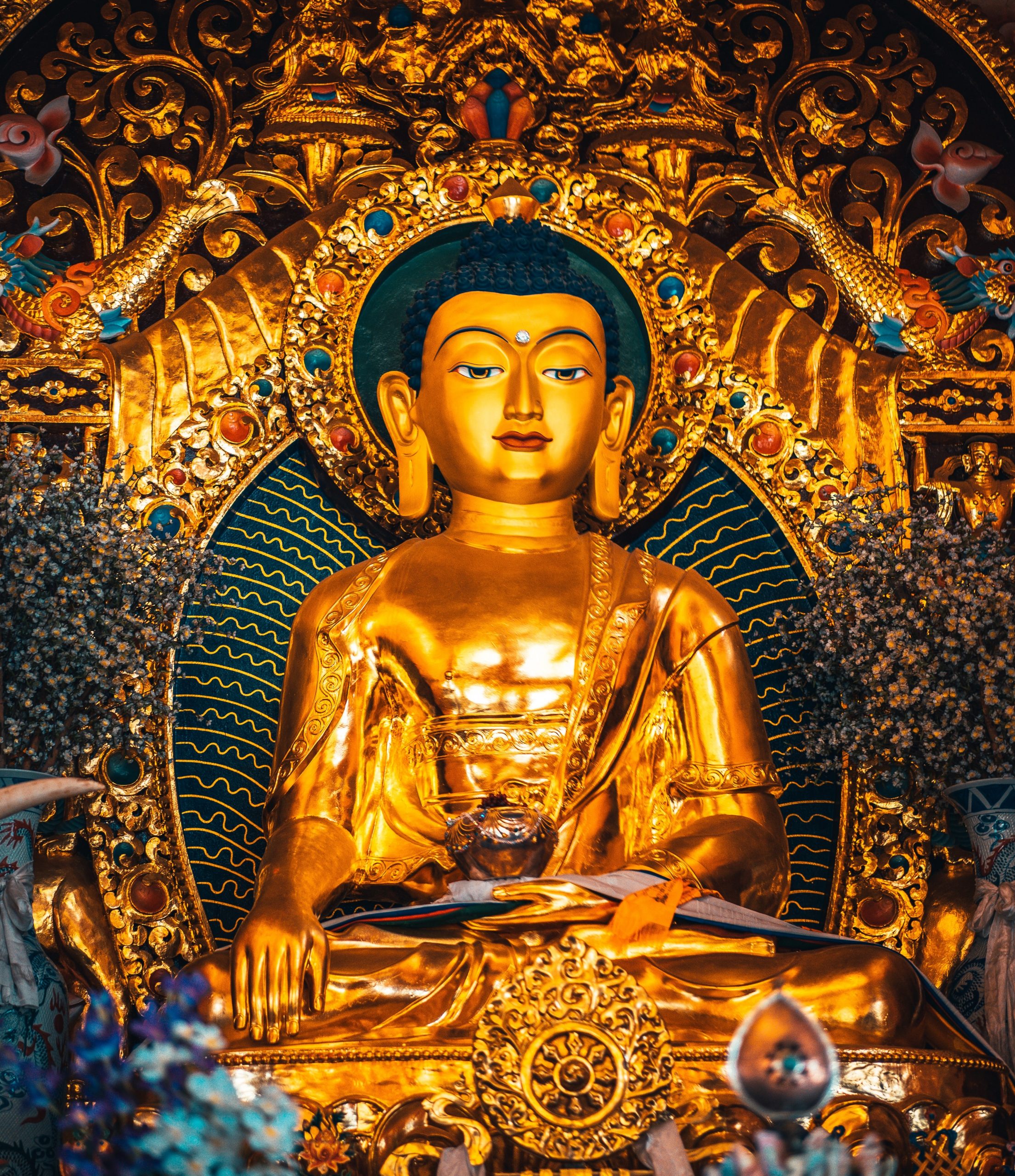 gold tibetan buddha sculpture