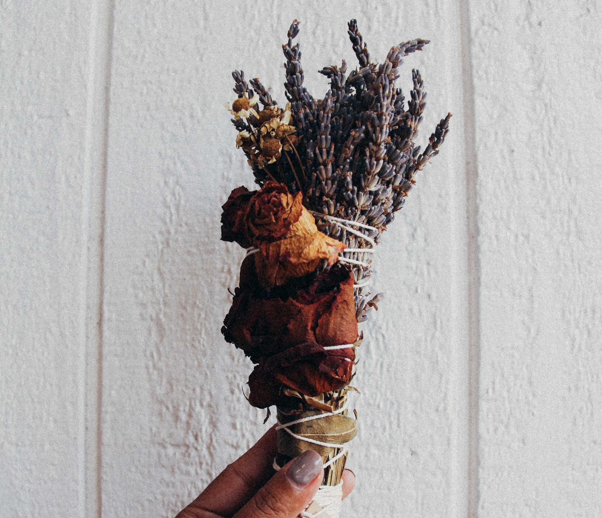 dried flower and herb smudge stick rose chamomile and lavender